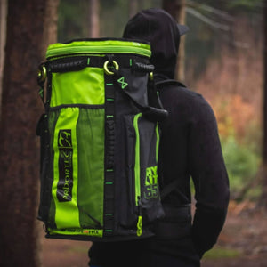 Green Arbortec Cobra Gear Bag 65L feature - an arborist with the backpack in the field
